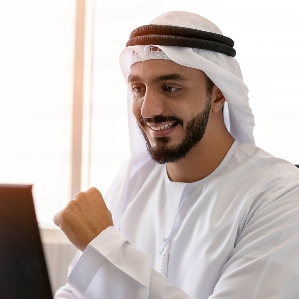 Emirati individual enjoying additional international health benefits beyond standard Thiqa insurance